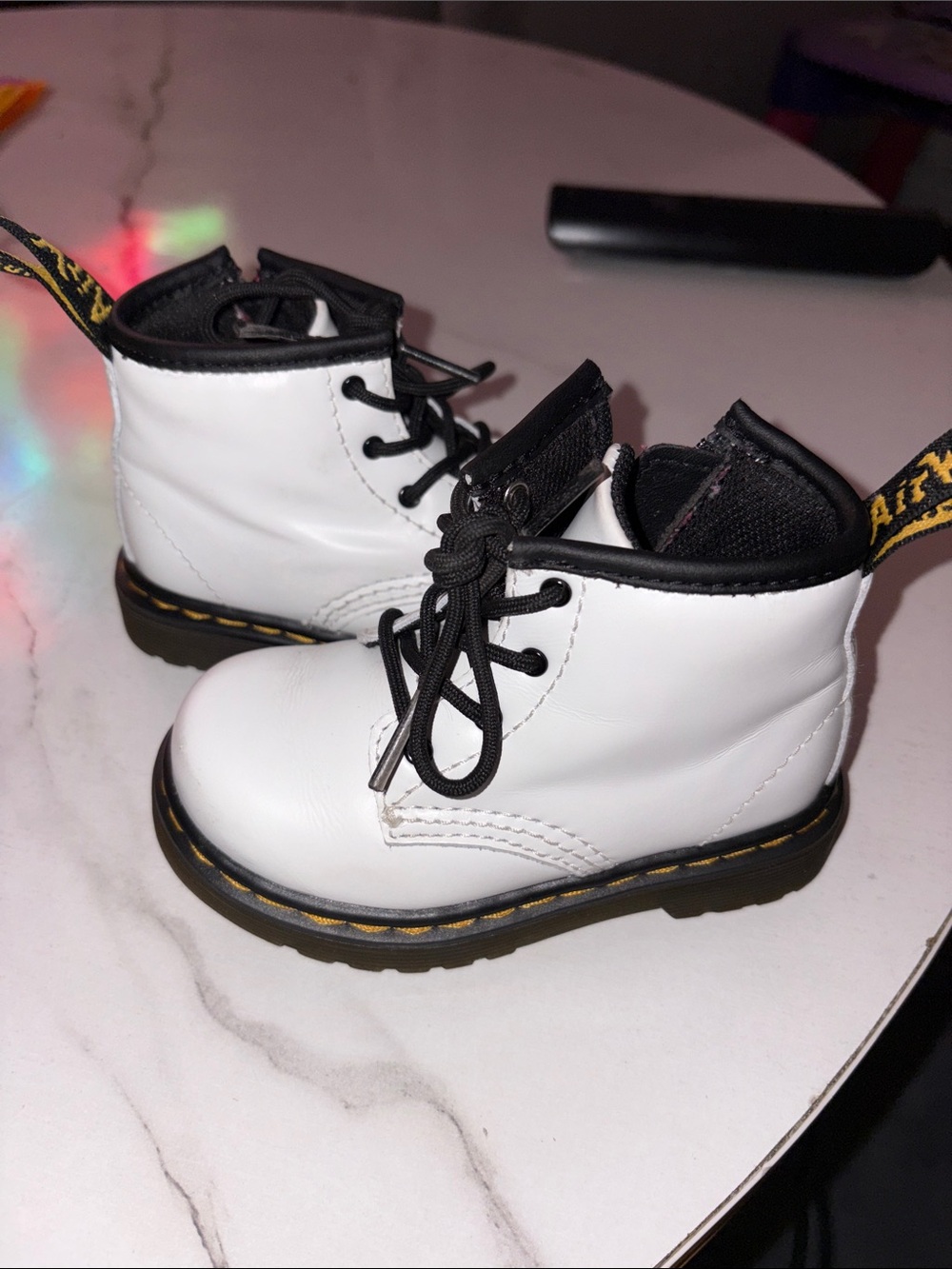 Dr. Martens Kids White Leather Lace-Up Boots with Black Trim - Picture 2 of 6